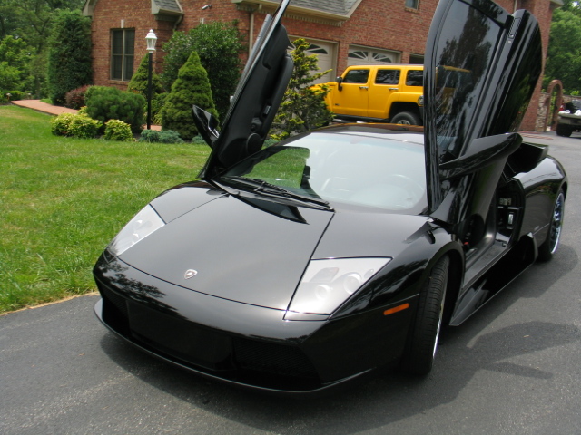 Black Lamborghini Murciélago Front View with Doors Up | Hagerstown Spring & Alignment