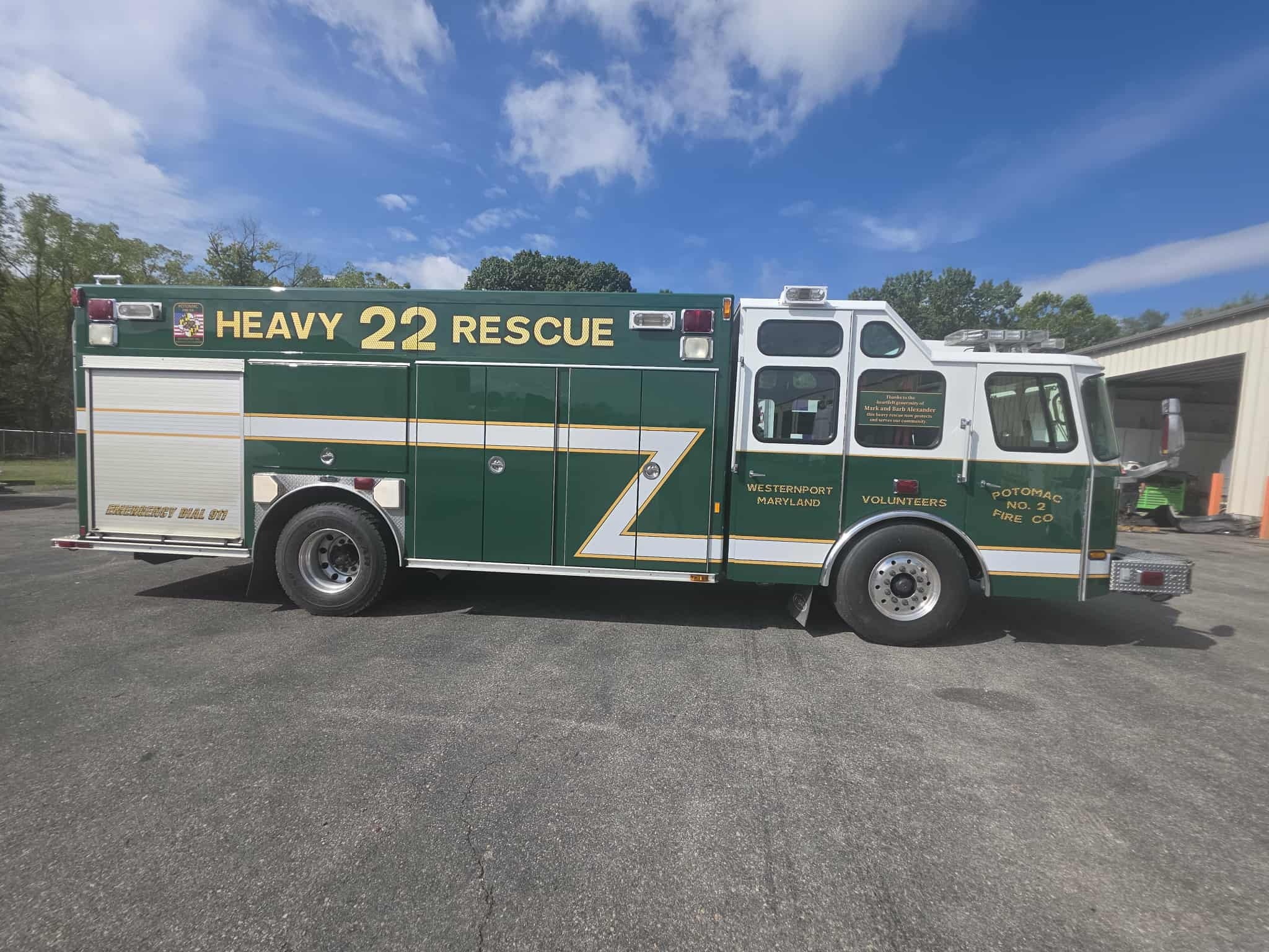 Green and White Heavy 22 Rescue Truck Side View at Shop | Hagerstown Spring & Alignment