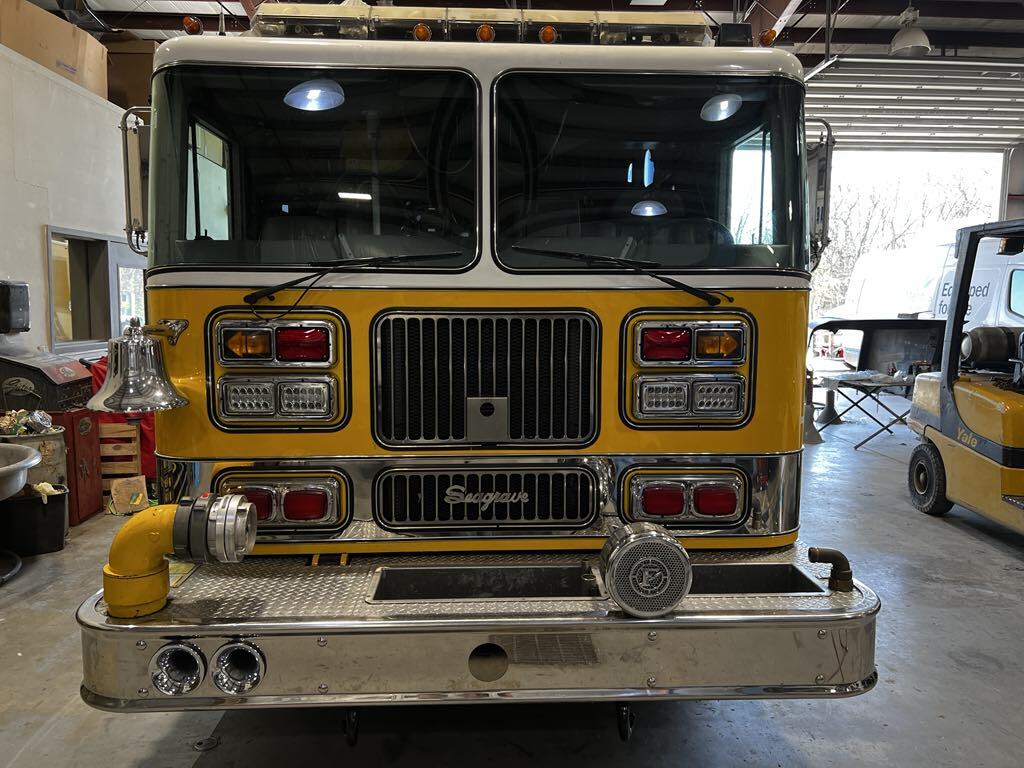 Yellow and White Fire Truck Front View Inside Body Shop | Hagerstown Spring & Alignment