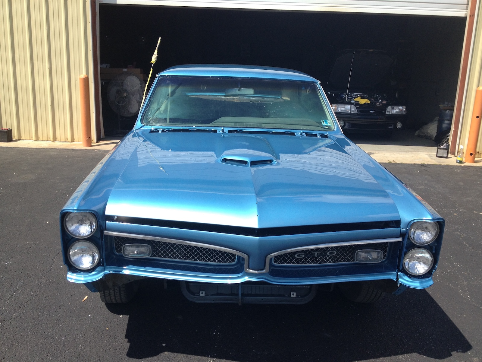 Freshly Painted Blue Pontiac GTO in Front of Shop | Hagerstown Spring & Alignment